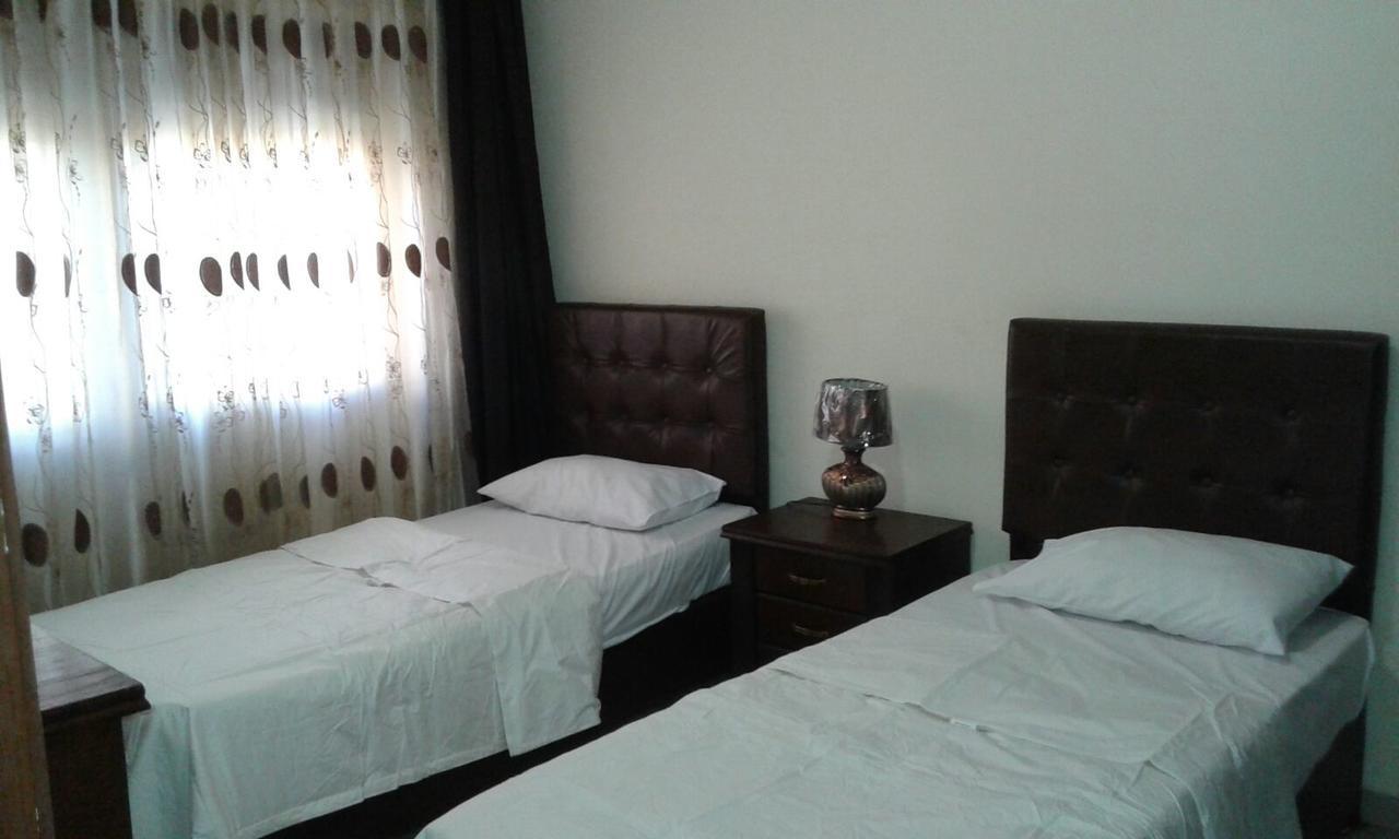 Al Tawheed Hotel Apartments Амман Экстерьер фото