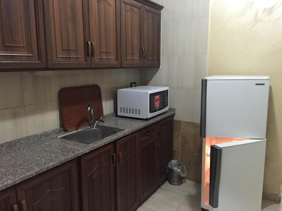 Al Tawheed Hotel Apartments Амман Экстерьер фото