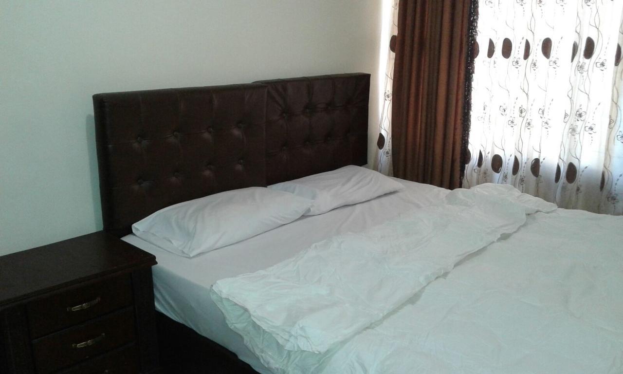 Al Tawheed Hotel Apartments Амман Экстерьер фото