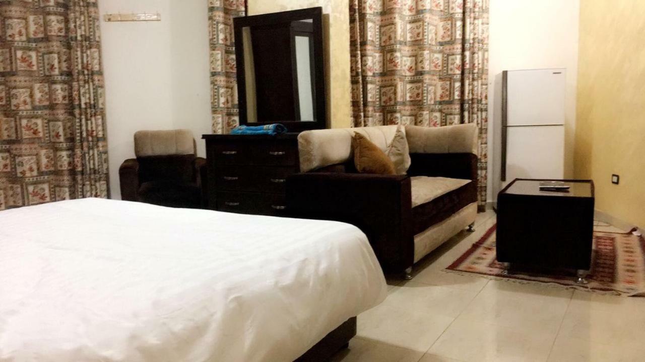 Al Tawheed Hotel Apartments Амман Экстерьер фото