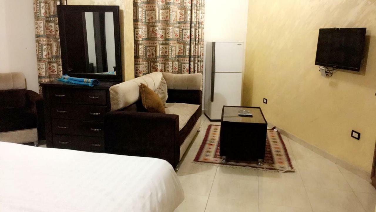 Al Tawheed Hotel Apartments Амман Экстерьер фото