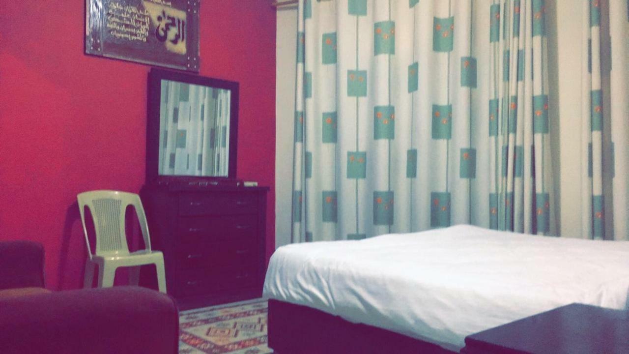 Al Tawheed Hotel Apartments Амман Экстерьер фото