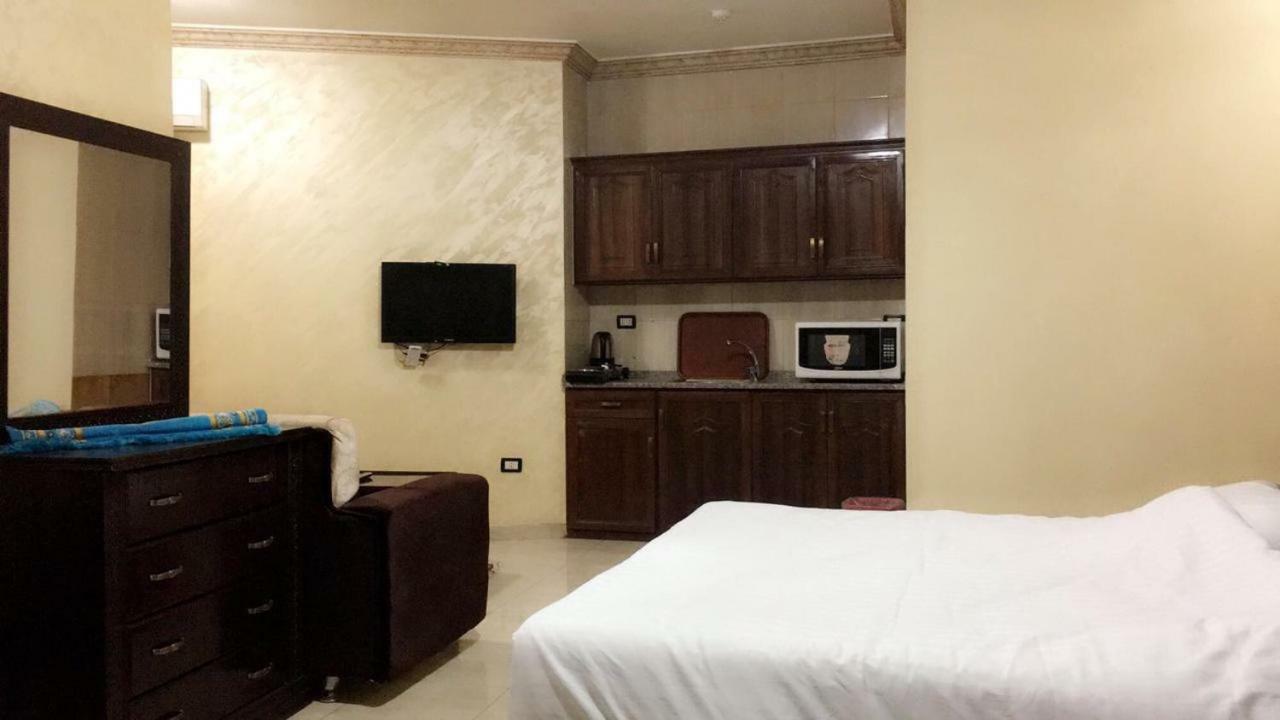 Al Tawheed Hotel Apartments Амман Экстерьер фото
